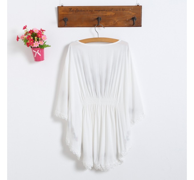 Блузка белая летучая мышь